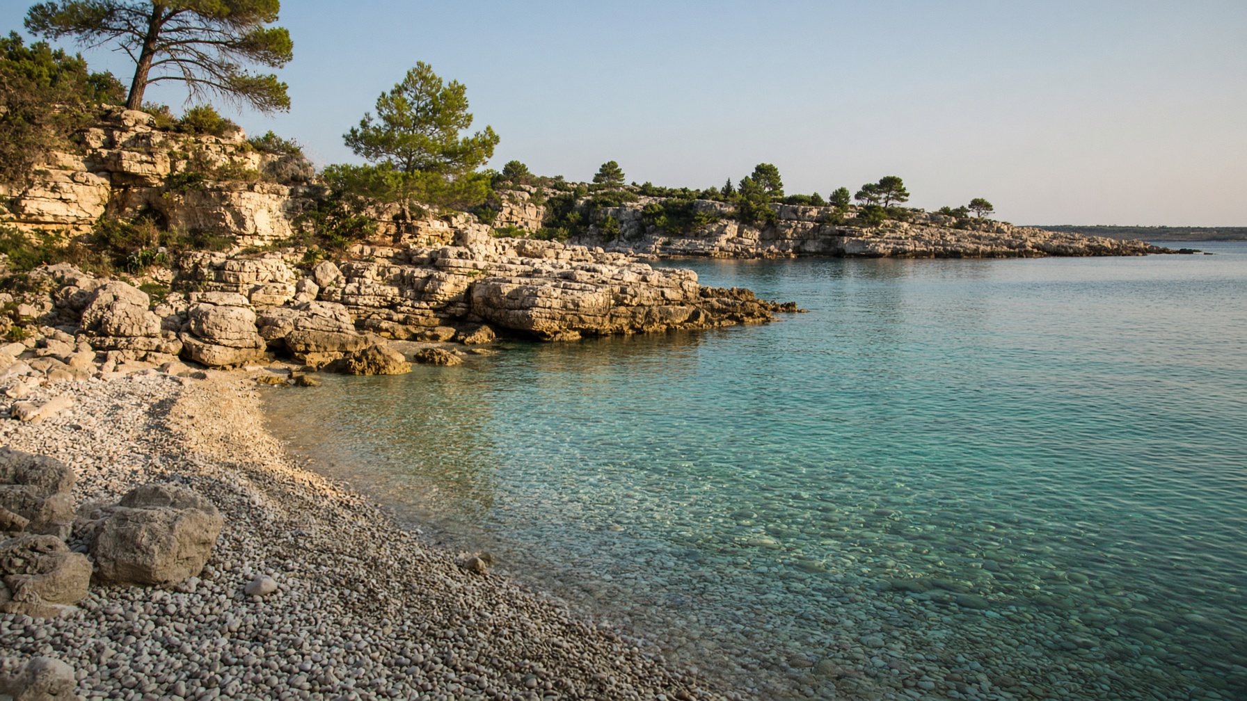 Pebble cove and clear water a short walk from the house